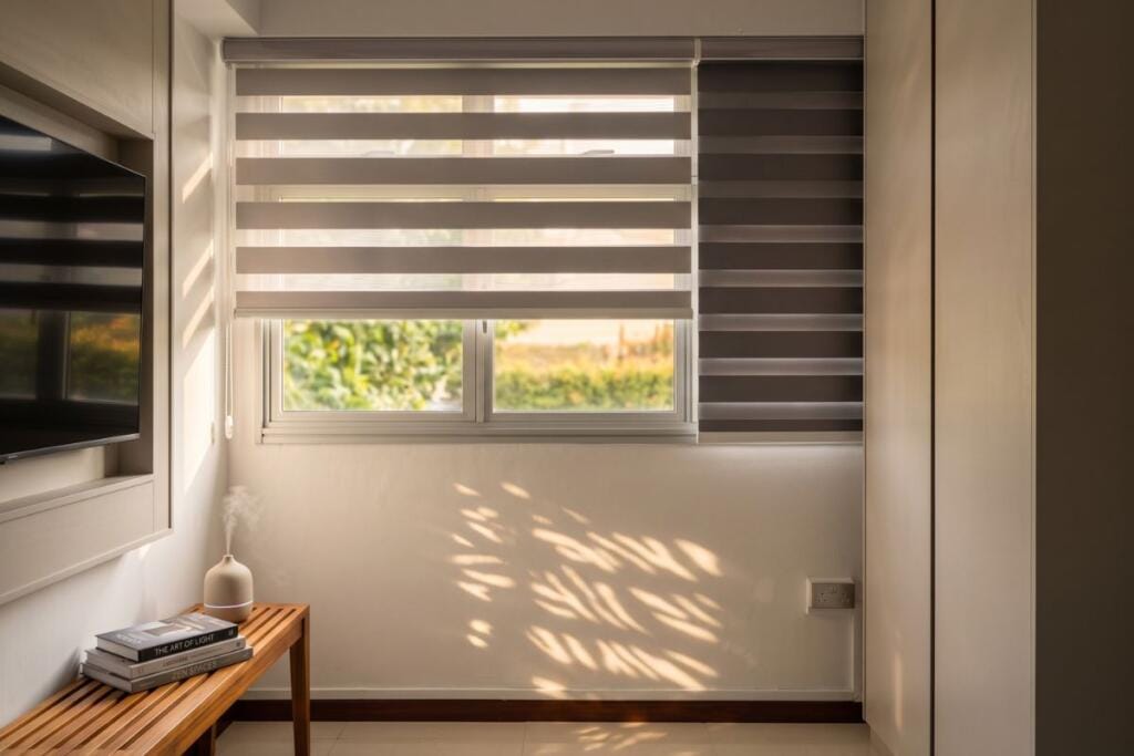 Blackout combi blinds for a Yishun HDB room in Singapore by Cornerstone