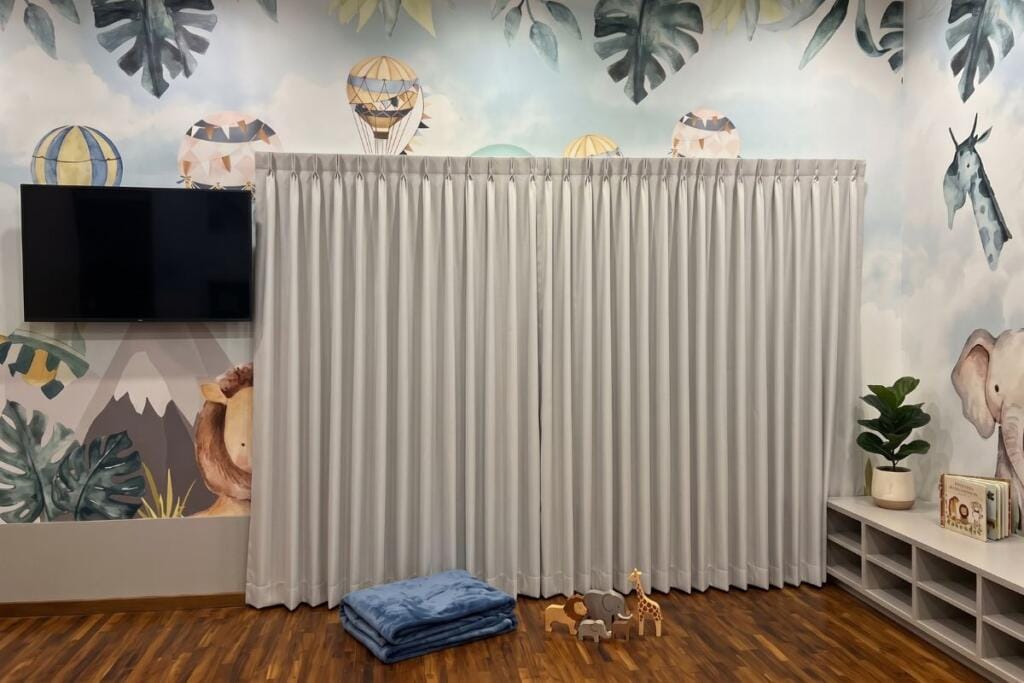 Full-length blackout curtains in a Tengah interior, Singapore by Cornerstone
