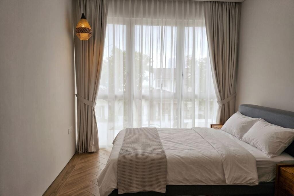 Day and blackout curtains in an Ang Mo Kio bedroom, Singapore by Cornerstone
