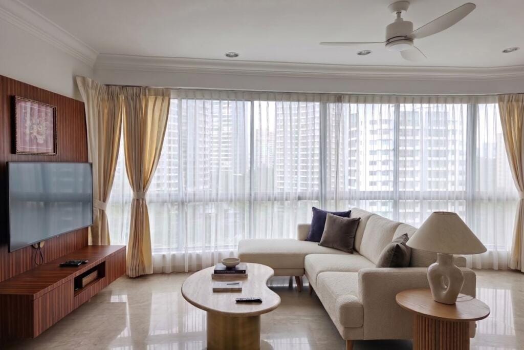 Day and night curtains for a Bukit Timah living room, Singapore by Cornerstone