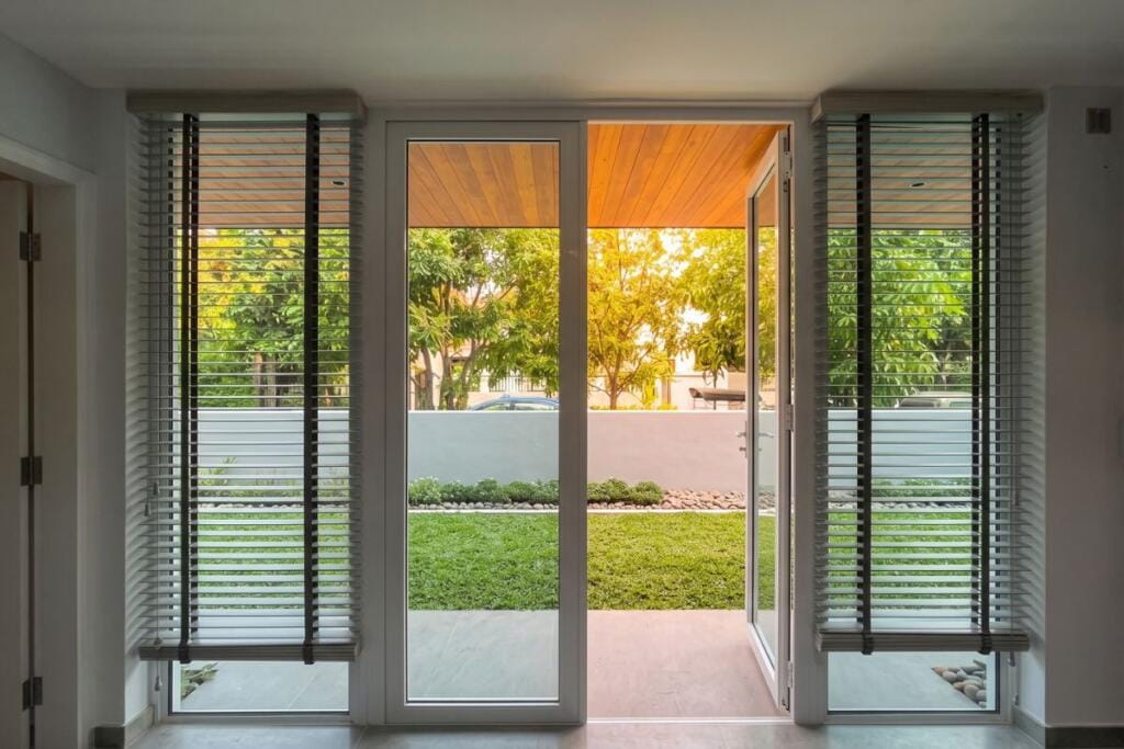 Faux wood Venetian blinds for a Woodlands landed home in Singapore by Cornerstone