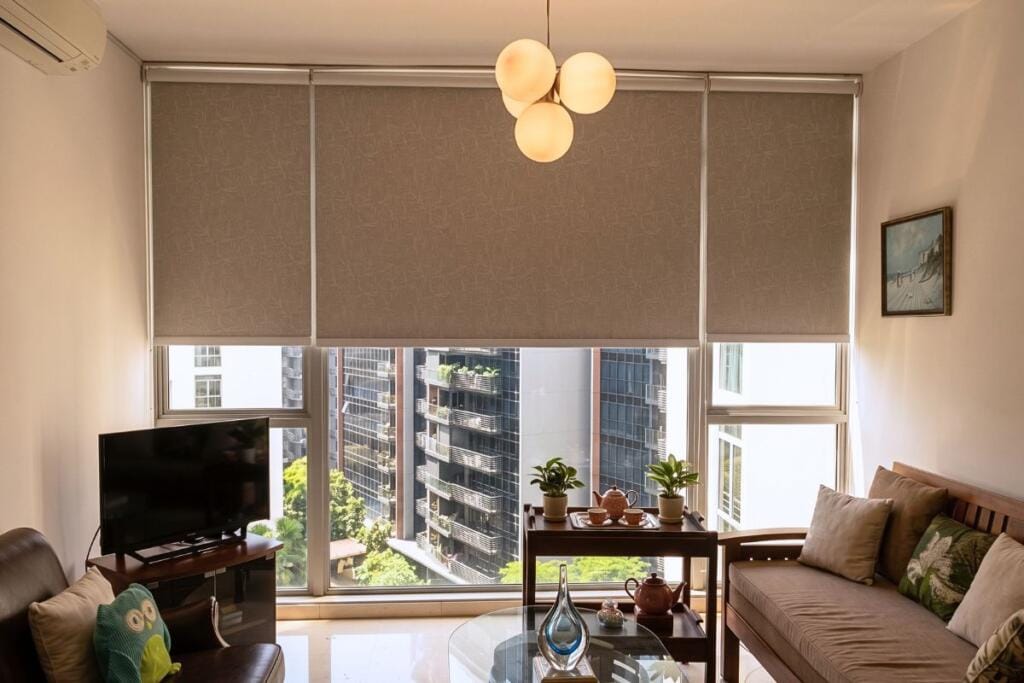 Blackout roller blinds for a Jurong West condo living room, Singapore by Cornerstone